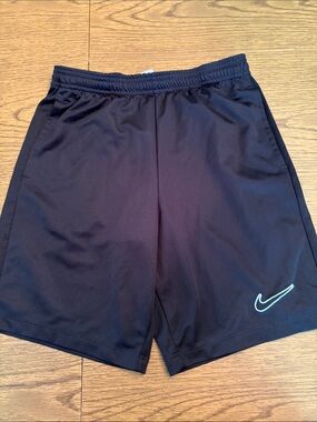 Nike Boy's Black Athletic Shorts with White Swoosh